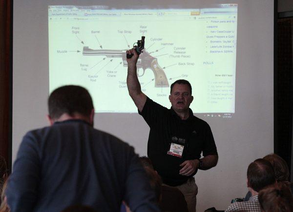 Firearm instructor Clark Aposhian teaches a concealed-weapons training class to 200 Utah teachers on Dec. 27, 2012, in West Valley City, Utah. (George Frey/Getty Images)