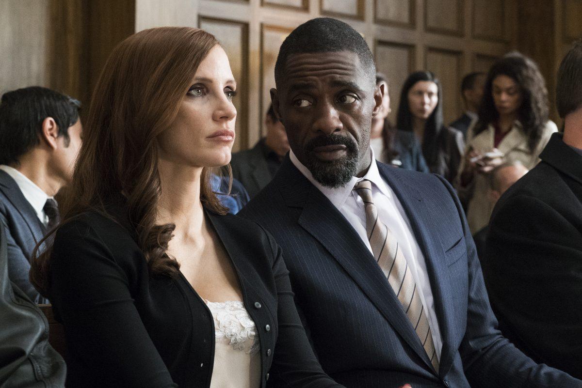 Jessica Chastain and Idris Elba star as client and lawyer in “Molly’s Game.” (Michael Gibson/Motion Picture Artwork/STX Financing, LLC)