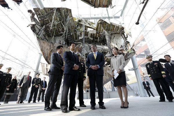 U.S. Secretary of Defense Ashton Carter (2nd R) and South Korean Defense Minister Han Min-koo (2nd L) visit the Cheonan ship that sank near Baengnyeong Island in the Yellow Sea after an apparent North Korean attack, during his visit to the Second Fleet Command in Pyeongtaek, South Korea, on April 10, 2015. (Jeon Heon-Kyun-Pool/Getty Images)