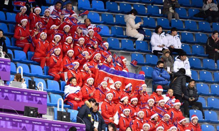 North Korean Olympic Cheerleader Caught Cheering for Americans