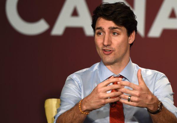 Canadian Prime Minister Justin Trudeau gestures while speaking during a business summit in Mumbai on Feb. 20, 2018. (Punit Paranjpe/AFP/Getty Images)
