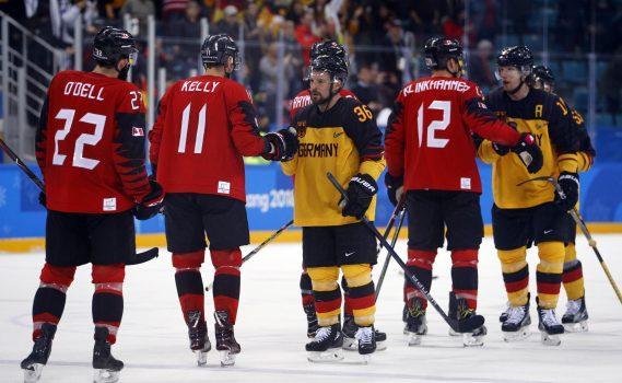 German and Canadian hockey players shake hands after the game at the Pyeongchang 2018 winter Olympics on Feb. 23, 2018.(Reuters/Brian Snyder)