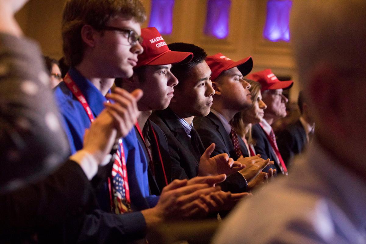 Audience members clap during a speech by president Donald Trump at the Conservative Political Action Conference (CPAC) in National Harbor, Md., on Feb. 23, 2018. (Samira Bouaou/The Epoch Times)