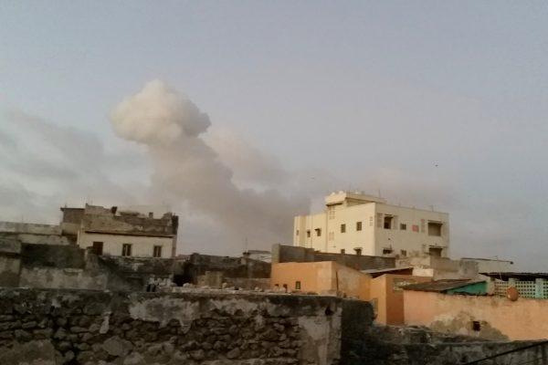 Smoke rises after car bombs explode in Mogadishu, Somalia Feb. 23, 2018. (Universal TV via Reuters)