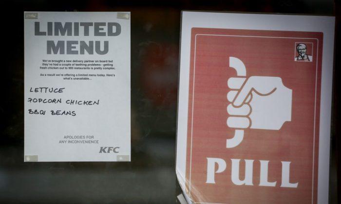 A sign warns that a limited menu is being operated at a branch of KFC in Bristol, England on Feb. 20, 2018. (Matt Cardy/Getty Images)