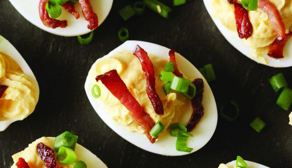 Buttermilk, bacon, and scallions enhance these stuffed eggs. (Courtesy of The Countryman Press)