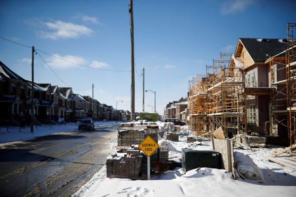 A sidewalk ends sign stands in front of a subdivision of houses that are under construction in East Gwillimbury in the Greater Toronto Area on Jan. 30, 2018. (Reuters/Mark Blinch)