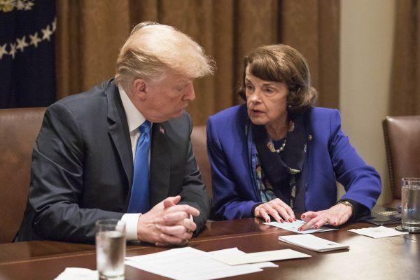 President Donald Trump speaks with Sen. Dianne Feinstein (D-Calif.) at a bipartisan Members of Congress to discuss school and community safety in the Cabinet Room of the White House in Washington on Feb. 28, 2018. (Samira Bouaou/The Epoch Times)