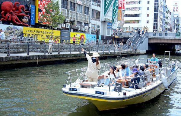 The Tombori River Cruise is a fun way to see the bustling Dōtonbori district. (Benjamin Yong)