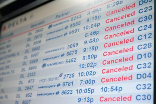 A flight monitor shows cancelled flights at LaGuardia Airport in Queens, New York, U.S., March 2, 2018. (Reuters/Amr Alfiky)
