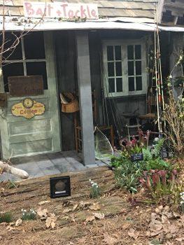 The Men’s Garden Club of Philadelphia designed a dilapidated fishing shack in the woods. (Isabelle Kellogg)