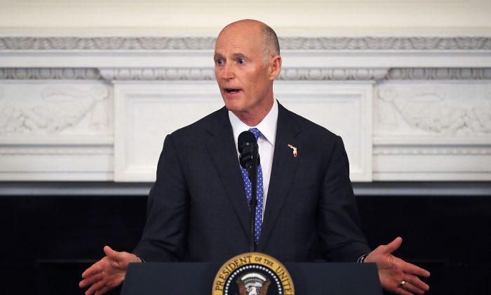 Florida Governor Rick Scott Sues Over Delayed Ballot Updates