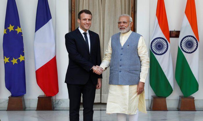 France Signs Deals Worth $16 Billion in India to Deepen Defense, Security Ties
