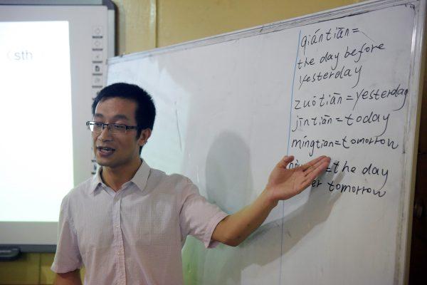 Chinese language teacher Fu Yongsheng points at the board during a class held at the Confucius Institute at the University of Lagos in Nigeria, on April 6, 2016. (Pius Utomi Ekpei/AFP/Getty Images)