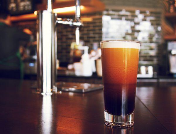 Nitro cold-brew coffee, increasingly served "on tap," boasts a creamy mouthfeel and foamy head, akin to beer. (Witukki/Shutterstock)