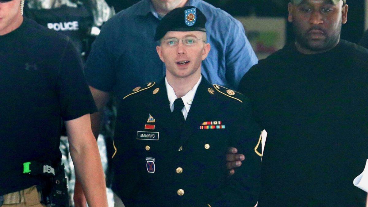 U.S. Army Private First Class Bradley Manning is escorted by military police as he leaves his military trial after he was found guilty of 20 out of 21 charges, at Fort George G. Meade, Maryland, on July 30, 2013. (Mark Wilson/Getty Images)