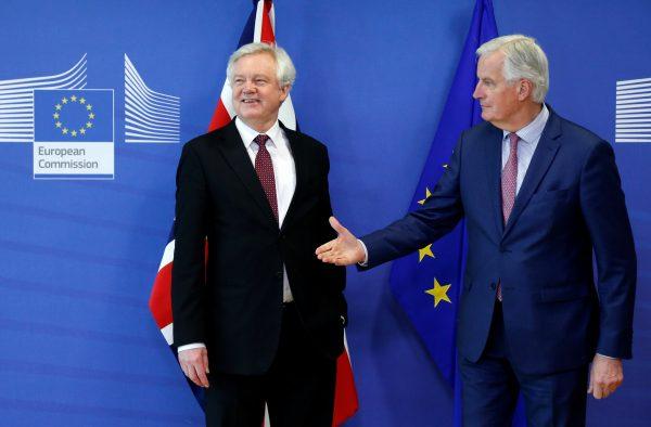 Britain's Secretary of State for Exiting the European Union David Davis and European Union's chief Brexit negotiator Michel Barnier pose ahead of a meeting in Brussels, Belgium, March 19, 2018. (Reuters/Francois Lenoir)
