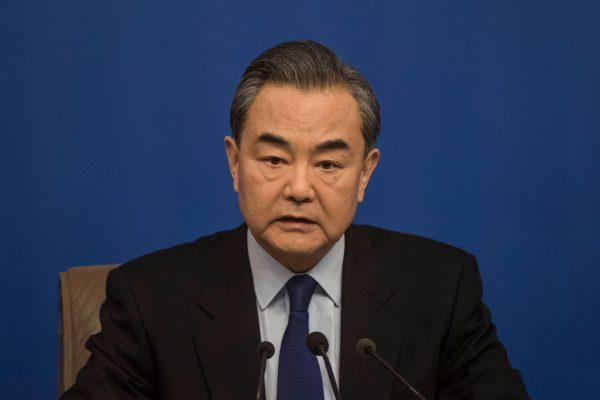 China's Foreign Minister Wang Yi attends a press conference during a session of China's rubber-stamp parliament, the National People's Congress, in Beijing on March 8, 2018. (Fred Dufour/AFP/Getty Images)