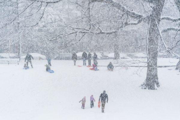 People go sledding in heavy snowfall in Philadelphia, Penn., on March 21, 2018. (Jessica Kourkounis/Getty Images)