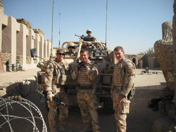 Mark Smith (L) when he was a soldier in Afghanistan. (SWNS)