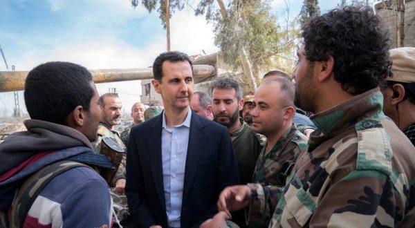 Syrian President Bashar al-Assad reported to be meeting with Syrian army soldiers in eastern Ghouta, Syria, March 18, 2018. (SANA/Handout via Reuters)