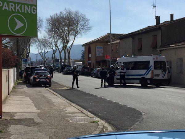 Police are seen at the scene of a hostage situation in a supermarket in Trèbes, Aude, France March 23, 2018 in this picture obtained from a social media video. (La Vie a Trebes/via Reuters)