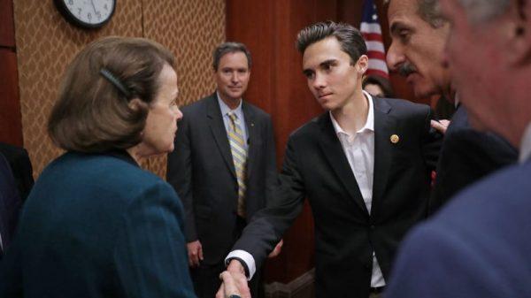 Sen. Dianne Feinstein (D-Calif.) (left) greets Marjory Stoneman Douglas High School shooting survivor David Hogg ahead of a news conference in the U.S. Capitol Visitors Center in Washington on March 22, 2018. (Chip Somodevilla/Getty Images)