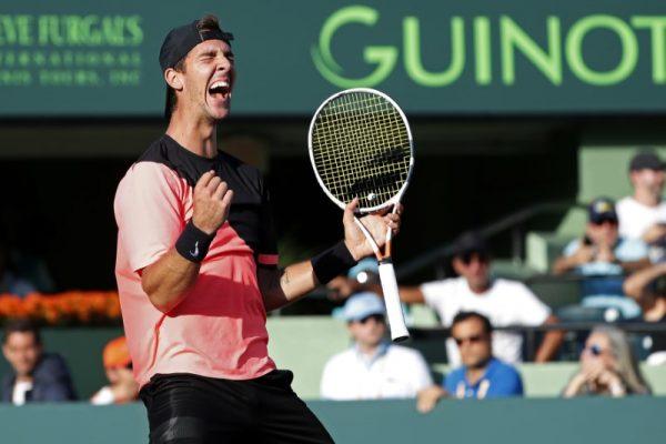 Thanasi Kokkinakis of Australia celebrates after match point against Roger Federer of Switzerland (not pictured) on day five of the Miami Open at Tennis Center at Crandon Park on Mar 24, 2018. Kokkinakis won 3-6, 6-3, 7-6(4). (Geoff Burke-USA TODAY Sports)