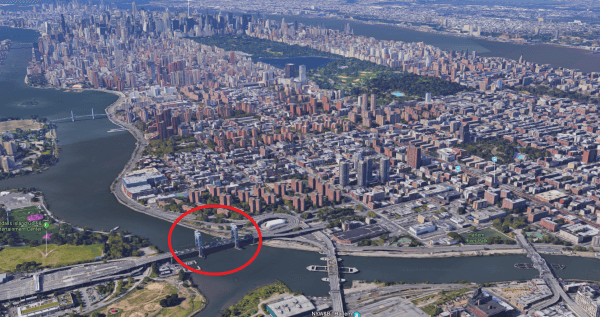 The Harlem River vertical-lift bridge with Manhattan in the background. (Screenshot via Google Maps)