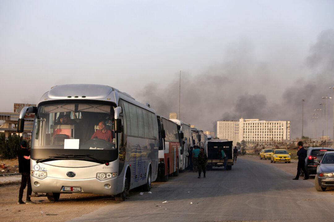 Thousands Leave Ghouta in Surrender of Enclave to Syrian Government