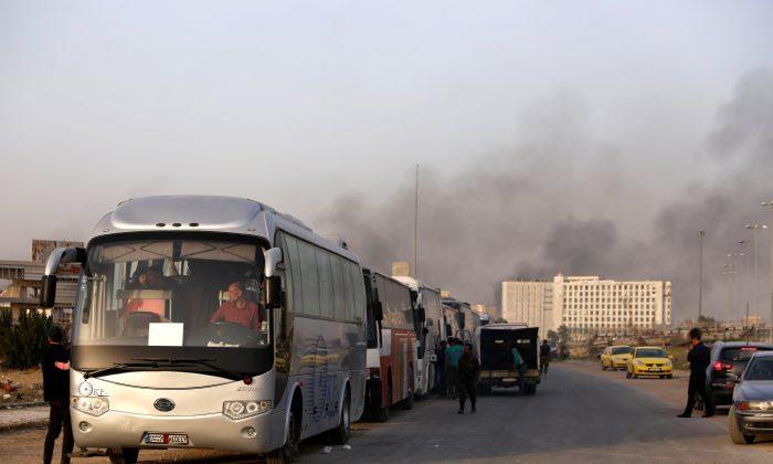 Thousands Leave Ghouta in Surrender of Enclave to Syrian Government