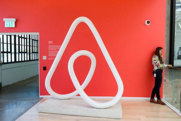 A woman talks on the phone at the Airbnb office headquarters in the SOMA district of San Francisco, California in August 2016. (Reuters/Gabrielle Lurie)