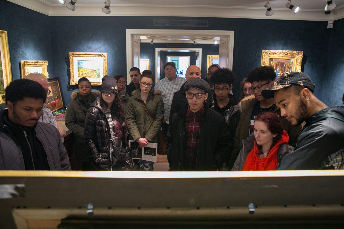 High school students from BAVPA along with their teacher, Sean Witucki, visit Rehs Galleries during their field trip to New York on March 9, 2018. (Milene Fernandez/The Epoch Times)