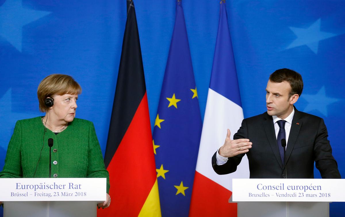 German Chancellor Angela Merkel and France's President Emmanuel Macron hold a joint news conference at a European Union leaders summit in Brussels, Belgium, on March 23, 2018. (Francois Lenoir/Reuters)