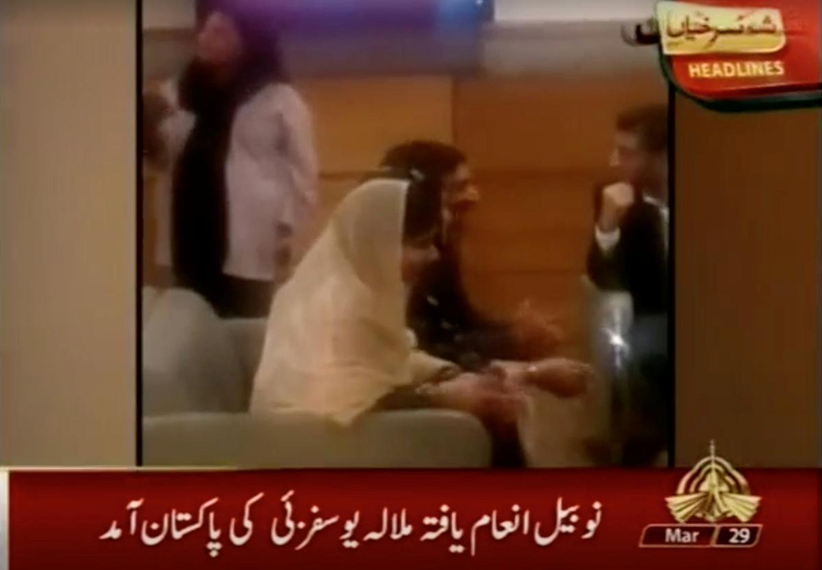 Nobel laureate and education activist Malala Yousafzai sits with her family in a VIP lounge of Islamabad Airport upon her arrival in Islamabad, Pakistan, in this still image taken from PTV video footage released on March 29, 2018. (PTV/via REUTERS)
