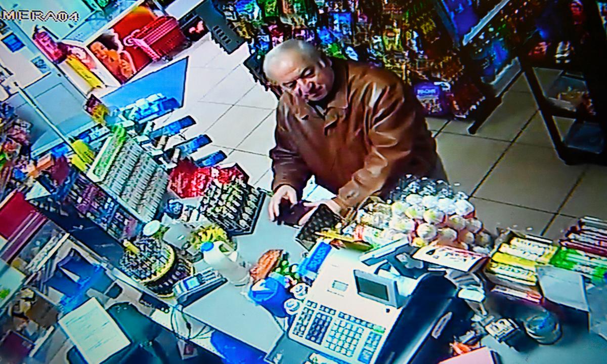 A still image from CCTV footage recorded on Feb. 27, 2018, shows former Russian spy Sergei Skripal buying groceries at the Bargain Stop convenience store in Salisbury on Feb. 27, 2018. (AFP/Getty Images)