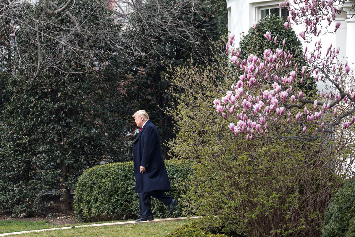 President Donald Trump before boarding Marine One on the South Lawn of the White House on Jan. 1, 2018. (Samira Bouaou/The Epoch Times)