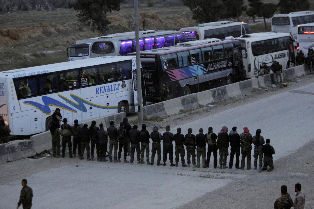 Last Eastern Ghouta Rebels Poised to Surrender: Syrian State Media