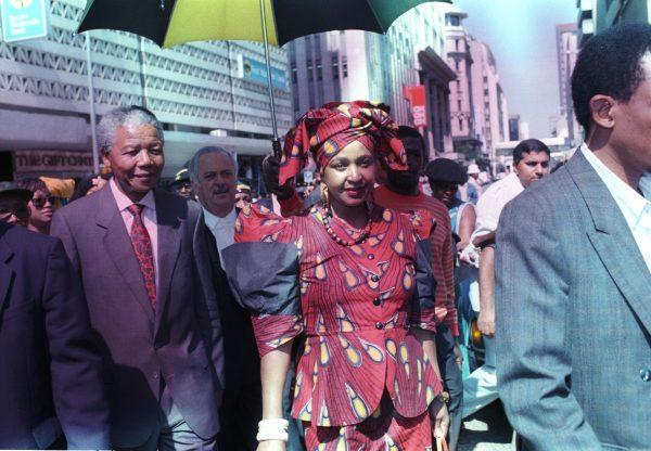Nelson and Winnie Mandela arrive at Johannesburg Supreme Court before her trial on charges of kidnapping and assault, 1991.<br/>(REUTERS/Juda Ngwenya)