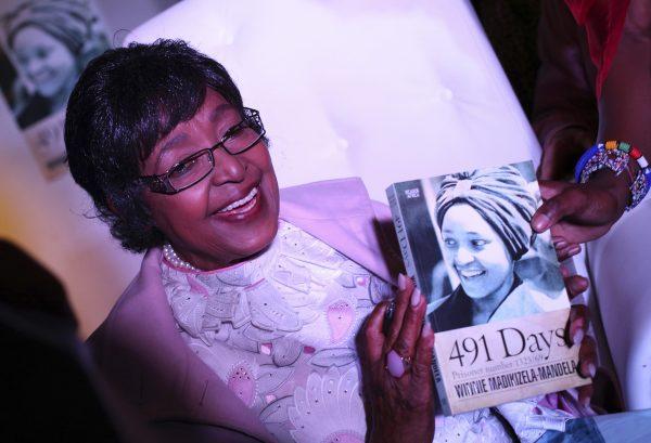Winnie Mandela smiles during a celebratory event around the release of her book titled '491 Days' in Johannesburg, August 2013. (REUTERS/Siphiwe Sibeko)