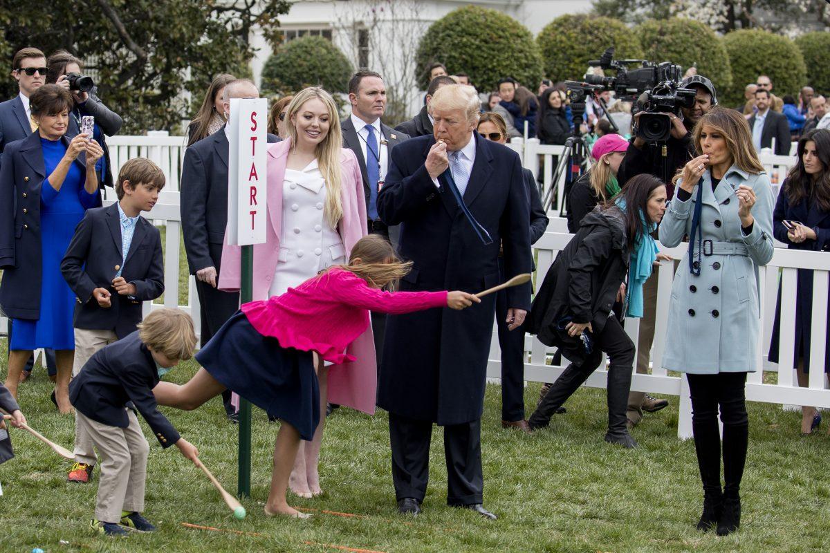 (L-R) Tiffany Trump, President Donald Trump and First Lady Melania Trump at the annual Easter Egg Roll on the South Lawn of the White House on April 2, 2018. (Samira Bouaou/The Epoch Times)