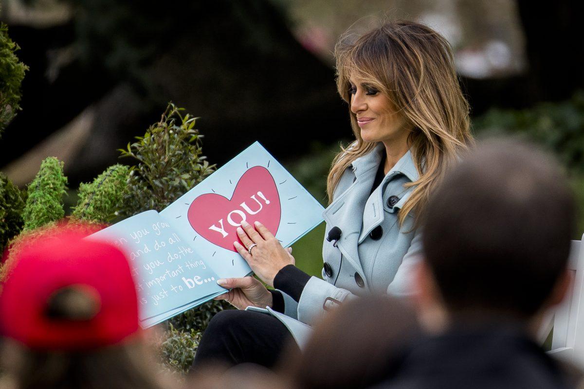 First Lady Melania Trump reads a children's book at the annual Easter Egg Roll on the South Lawn of the White House on April 2, 2018. (Samira Bouaou/The Epoch Times)