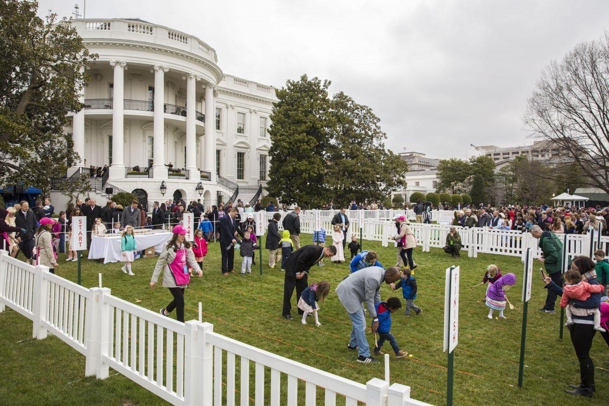 Children roll eggs at the annual Easter Egg Roll on the South Lawn of the White House on April 2, 2018. (Samira Bouaou/The Epoch Times)