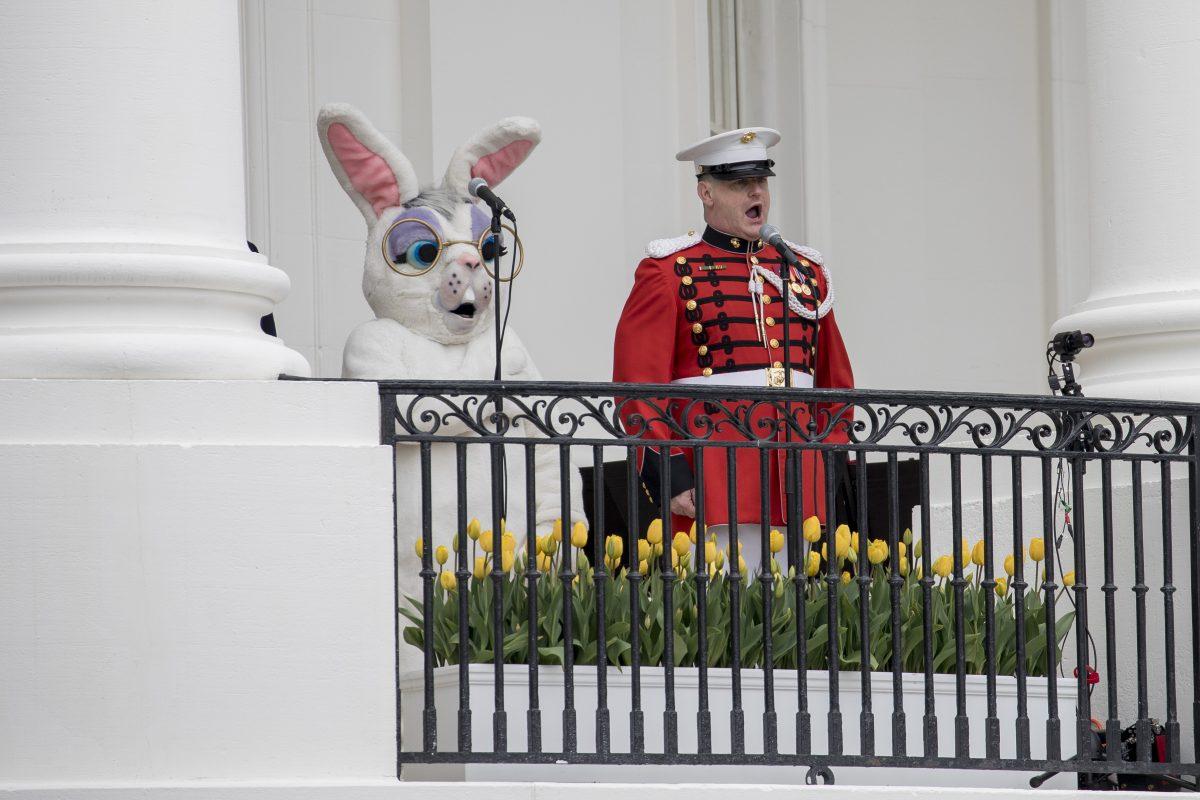 A U.S. Marine Band member performs the National Anthem at the annual Easter Egg Roll on the South Lawn of the White House on April 2, 2018. (Samira Bouaou/The Epoch Times)