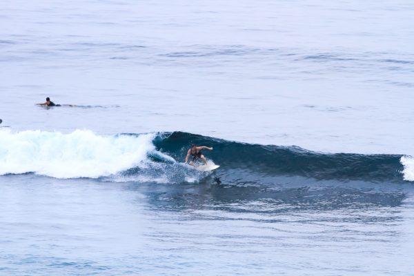 Surfing the waves in Indonesia. (David Lawes)