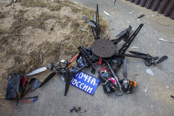 A view shows a damaged mail delivery drone, which crashed into a building, shortly after a test launch, part of the Russian Post’s project to deliver mail to remote regions by drone, in Ulan-Ude, the capital city of the Republic of Buryatia, Russia April 2, 2018. (Reuters/Anna Ogorodnik)