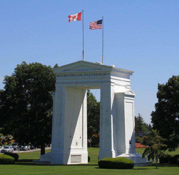 The Peace Arch monument near the westernmost point of the Canada–U.S. border, between Blaine, Washington, and Surrey, British Columbia, sits on the exact line between the two countries. (Waqcku at English Wikipedia)
