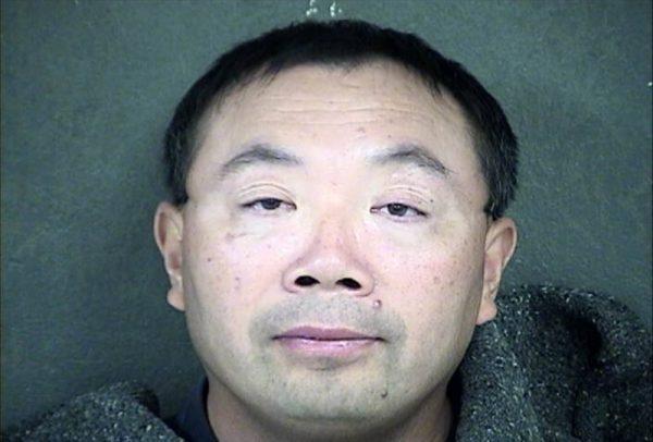 Zhang Weiqiang is shown in this Wyandotte County Detention Center handout photo released to Reuters on Dec. 12, 2013. (Wyandotte County Detention Center/Handout via Reuters)
