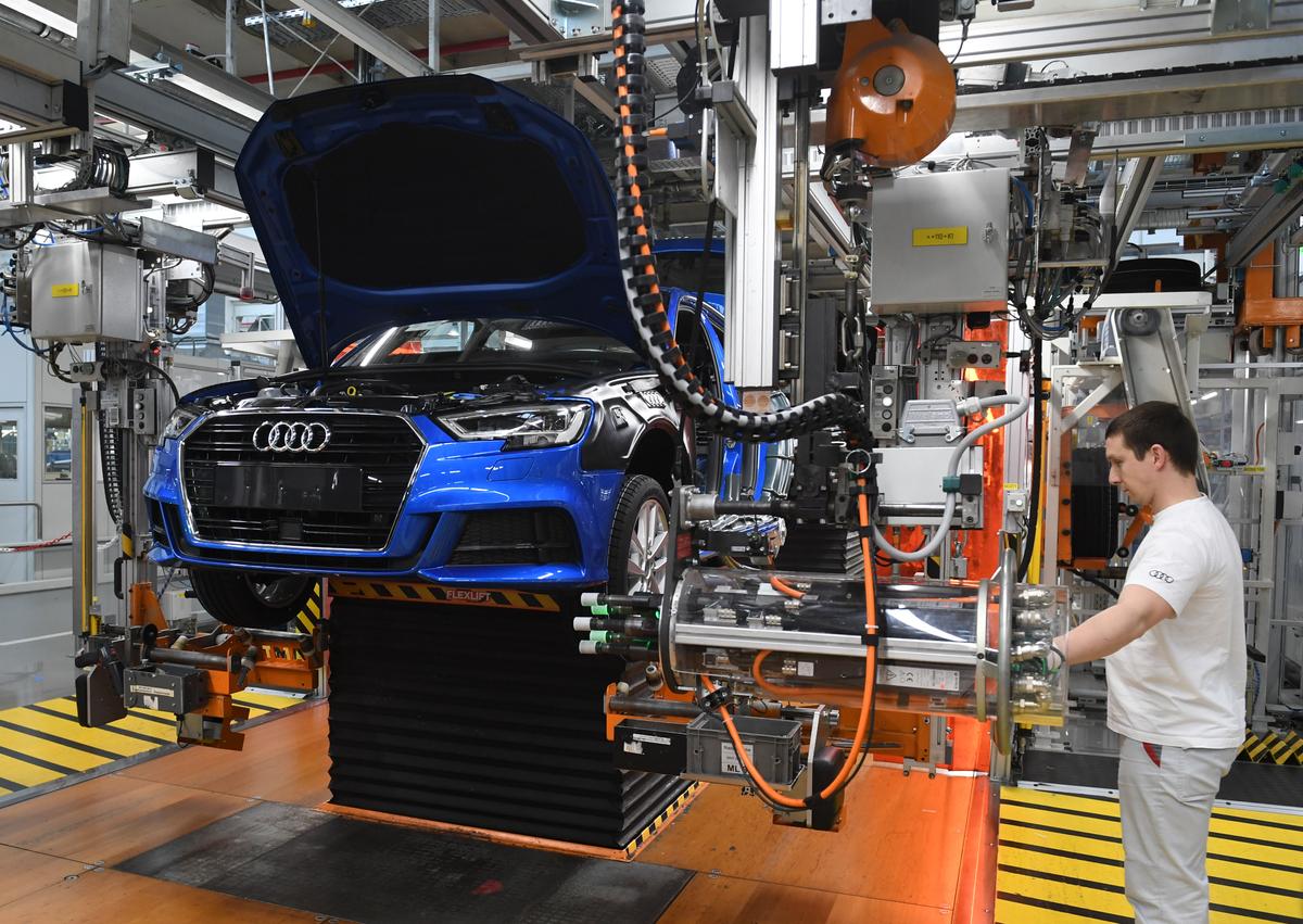 An employee of the German carmaker Audi is pictured at the production line in Ingolstadt, southern Germany, on March 14, 2018. (Christof Stache/AFP/Getty Images)