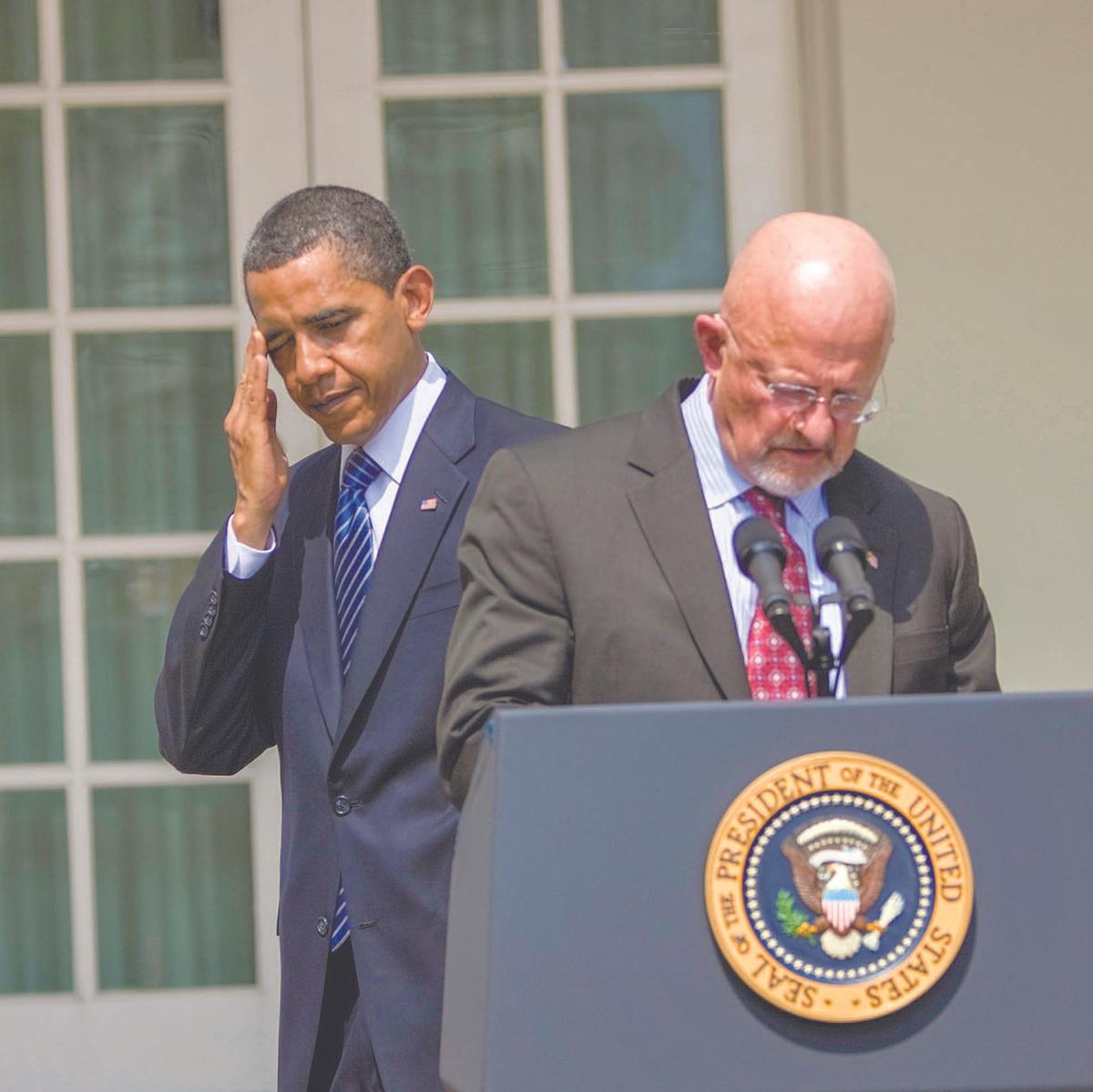 President Barack Obama and Director of Intelligence nominee James Clapper in the Rose Garden of the White House June 5, 2010. (BRENDAN SMIALOWSKI/GETTY IMAGES)